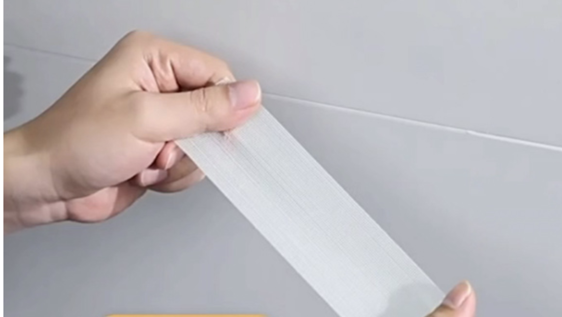Cinta de doble cara a base de tela de malla transparente
